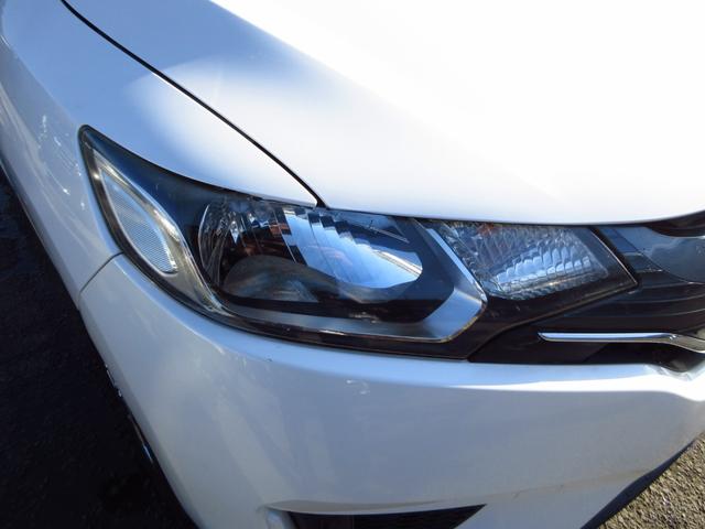 フィット 13G・Fパッケージ 5速マニュアル ナビ ブルートゥース ETC Bカメラ 前後ドライブレコーダー スマートキー アイストップ 社外アルミ CTBA ドアバイザー プライバシーガラス カーテンエアバッグ 保証書(23枚目)