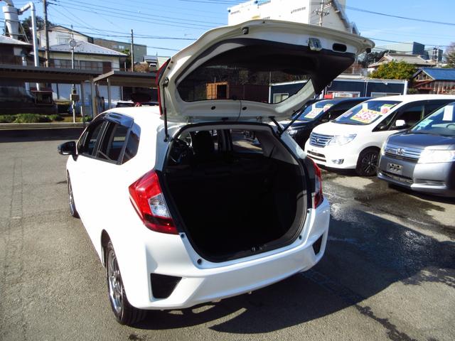 フィット 13G・Fパッケージ 5速マニュアル ナビ ブルートゥース ETC Bカメラ 前後ドライブレコーダー スマートキー アイストップ 社外アルミ CTBA ドアバイザー プライバシーガラス カーテンエアバッグ 保証書(37枚目)