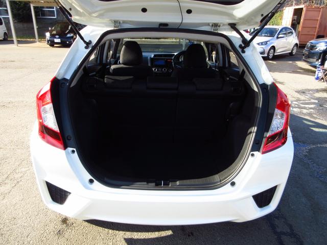 フィット 13G・Fパッケージ 5速マニュアル ナビ ブルートゥース ETC Bカメラ 前後ドライブレコーダー スマートキー アイストップ 社外アルミ CTBA ドアバイザー プライバシーガラス カーテンエアバッグ 保証書(38枚目)