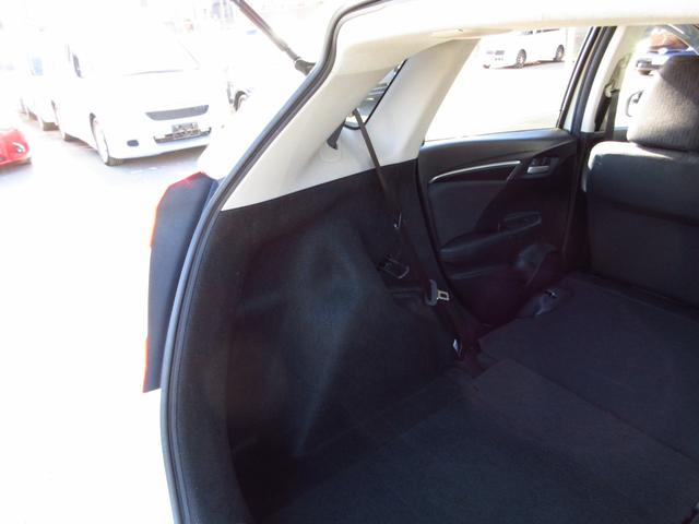 フィット 13G・Fパッケージ 5速マニュアル ナビ ブルートゥース ETC Bカメラ 前後ドライブレコーダー スマートキー アイストップ 社外アルミ CTBA ドアバイザー プライバシーガラス カーテンエアバッグ 保証書(42枚目)