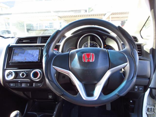 フィット 13G・Fパッケージ 5速マニュアル ナビ ブルートゥース ETC Bカメラ 前後ドライブレコーダー スマートキー アイストップ 社外アルミ CTBA ドアバイザー プライバシーガラス カーテンエアバッグ 保証書(45枚目)