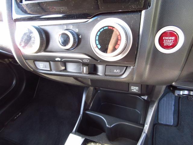 フィット 13G・Fパッケージ 5速マニュアル ナビ ブルートゥース ETC Bカメラ 前後ドライブレコーダー スマートキー アイストップ 社外アルミ CTBA ドアバイザー プライバシーガラス カーテンエアバッグ 保証書(47枚目)