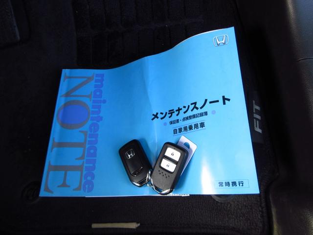 フィット 13G・Fパッケージ 5速マニュアル ナビ ブルートゥース ETC Bカメラ 前後ドライブレコーダー スマートキー アイストップ 社外アルミ CTBA ドアバイザー プライバシーガラス カーテンエアバッグ 保証書(64枚目)