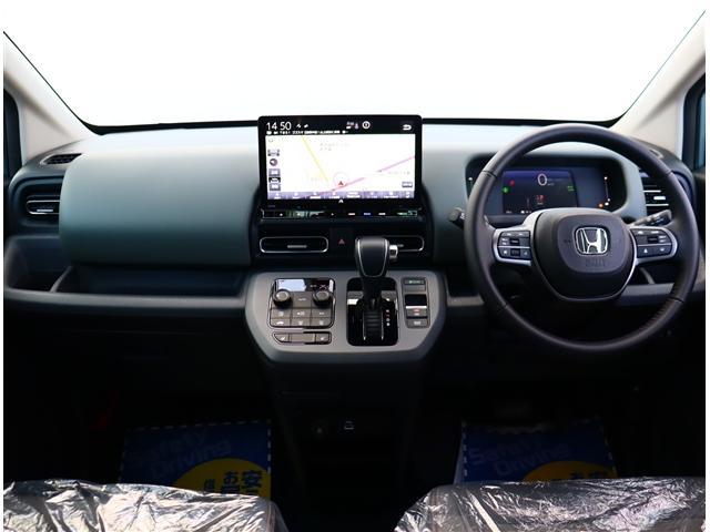 フリード ｅ：ＨＥＶクロスター　登録済未使用車　１１．４型ホンダコネクトナビ　フルセグ　ＤＶＤ　バックカメラ　ナビ＆ＴＶ　両側電動スライド　コーナーセンサー　ＢＳＩ　アダプティブクルーズ　ＬＥＤ　シートヒーター　オートエアコン（7枚目）