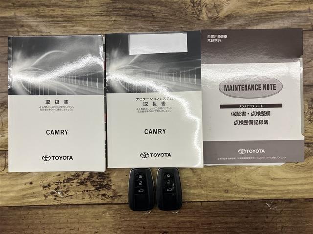 カムリ Ｇレザーパッケージ　衝突被害軽減　ＤＶＤプレーヤー　１００Ｖ電源　定期点検記録簿　ＬＥＤランプ　ナビＴＶ　横滑り防止　電動シート　地デジＴＶ　イモビライザー　エアバッグ　キーフリー　メモリ－ナビ　オートクルーズ　ＡＢＳ（20枚目）