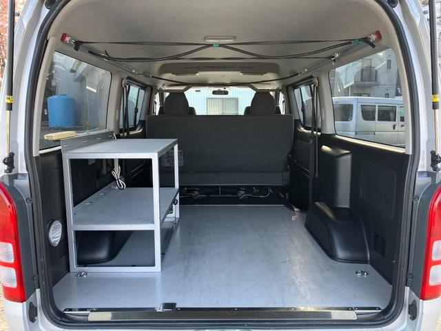 ハイエースバン ロングワイドスーパーＧＬ　１年保証　１オーナー　キャンピングベース車　元公共応急作業車（ＮＴＴ）　４ＷＤ　キーレス　フォグ　オートライト　ＥＴＣ　パナソニック製ナビ　フルセグ　バックカメラ　ＣＤ録音　ＤＶＤ／ＣＤ／ＳＤ（13枚目）