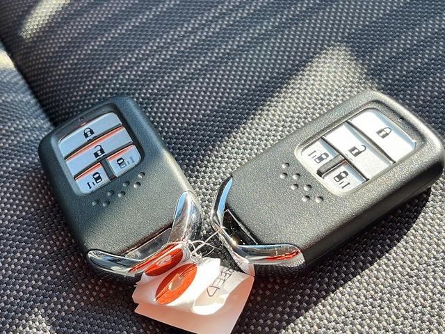 フリード G・ホンダセンシング 7人乗 アイドリングストップ 純正メモリーナビ フルセグ バックカメラ プッシュスタート キーフリー 両側パワースライドドア クルーズコントロール ドラレコ LED ETC ハーフレザーシート(18枚目)