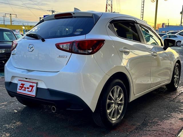 デミオ １３Ｓツーリング　アイドリングストップ　スマートシティーブレーキサポート　純正ＳＤナビ　バックカメラ　プッシュスタート　キーフリー　ヘッドアップディスプレイ　前席シートヒーター　ＭＴモードＡＴ　ＨＩＤ　ＥＴＣ　当店下取（5枚目）