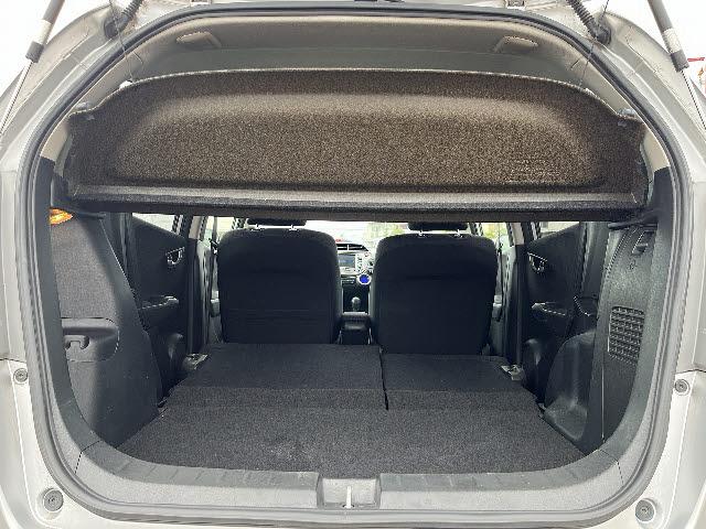 フィットハイブリッド ナビプレミアムセレクション　純正ＨＤＤナビ　ワンセグＴＶ　バックカメラ　シートヒーター　ＨＩＤヘッドライト　キーフリー　純正１５インチアルミ　ＤＶＤ再生　パドルシフト　ビルトインＥＴＣ　Ｂｌｕｅｔｏｏｔｈ　フォグランプ（20枚目）