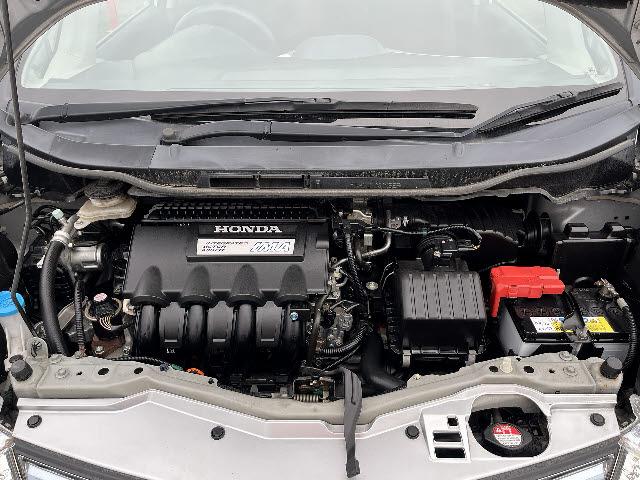 フィットハイブリッド ナビプレミアムセレクション　純正ＨＤＤナビ　ワンセグＴＶ　バックカメラ　シートヒーター　ＨＩＤヘッドライト　キーフリー　純正１５インチアルミ　ＤＶＤ再生　パドルシフト　ビルトインＥＴＣ　Ｂｌｕｅｔｏｏｔｈ　フォグランプ（28枚目）