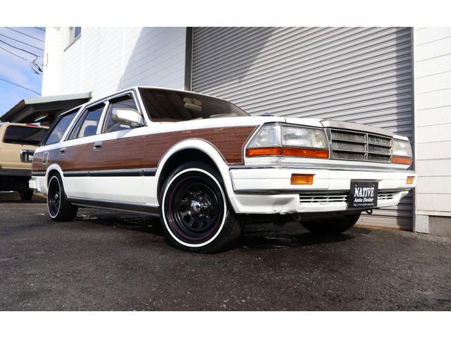 セドリックワゴン ＳＧＬ　サーフスタイル　ウッドデカール　新品デイトナブラック　新品ホワイトタイヤ　ＬＥＤヘッドライト　ＥＴＣ　タイミングベルト交換済み（8枚目）