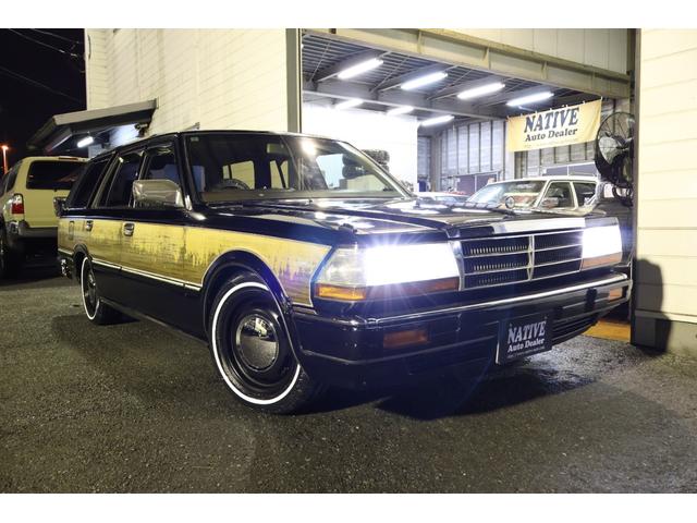 グロリアワゴン ＳＧＬリミテッド　サーフスタイル　ベンチシート　コラムオートマ　ウッドデカール　　新品ＮｅｏＭｏｏｎ　新品ホワイトリボンタイヤ　ＬＥＤヘッドライト　インダッシュＨＤＤナビ地デジ　ＥＴＣ　タイミングベルト交換済み（5枚目）