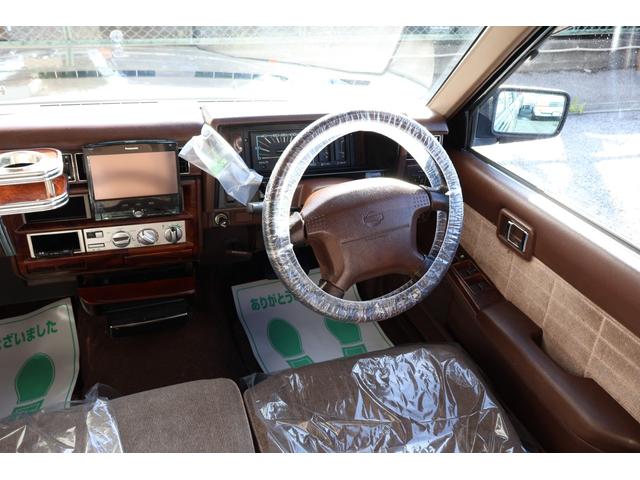 グロリアワゴン ＳＧＬリミテッド　サーフスタイル　ベンチシート　コラムオートマ　ウッドデカール　　新品ＮｅｏＭｏｏｎ　新品ホワイトリボンタイヤ　ＬＥＤヘッドライト　インダッシュＨＤＤナビ地デジ　ＥＴＣ　タイミングベルト交換済み（21枚目）