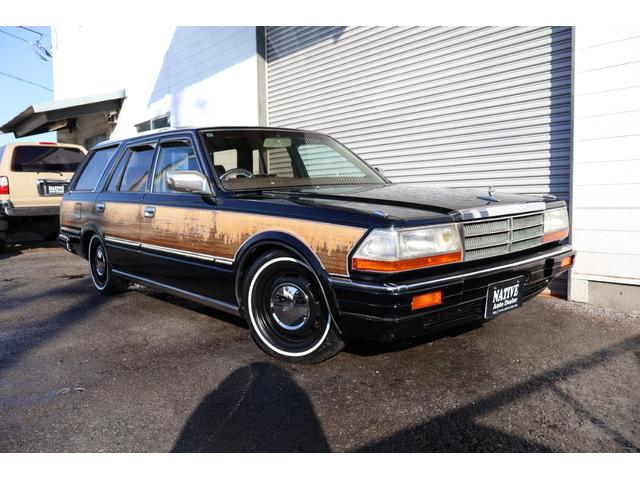 グロリアワゴン ＳＧＬリミテッド　サーフスタイル　ベンチシート　コラムオートマ　ウッドデカール　　新品ＮｅｏＭｏｏｎ　新品ホワイトリボンタイヤ　ＬＥＤヘッドライト　インダッシュＨＤＤナビ地デジ　ＥＴＣ　タイミングベルト交換済み（70枚目）