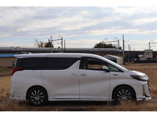 アルファード 3.5ロイヤルラウンジSP フルパーテーション 24インチ後席ディスプレイ JBLプレミアムサウンド リラクゼーションシステム エクストラキャビネット 冷蔵庫 置くだけ充電 調光ウインドゥ モデリスタフルエアロ(5枚目)