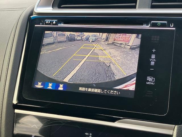 フィットハイブリッド Ｌパッケージ　４ＷＤ　オートクルーズ　ハーフレザー　ナビ　フルセグ　Ｂカメラ　Ｂｌｕｅｔｏｏｔｈオーディオ　ＥＴＣ　Ｉストップ　ＬＥＤヘッドライト　１５インチＡＷ　スマキー　禁煙車　横滑り防止　ＡＢＳ　電格ミラー（5枚目）