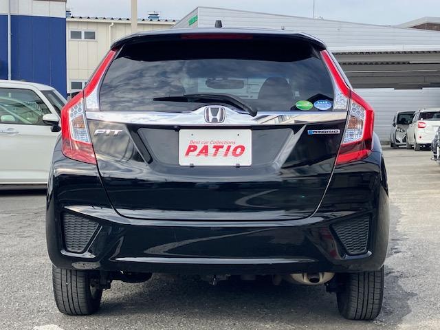 フィットハイブリッド Ｌパッケージ　４ＷＤ　オートクルーズ　ハーフレザー　ナビ　フルセグ　Ｂカメラ　Ｂｌｕｅｔｏｏｔｈオーディオ　ＥＴＣ　Ｉストップ　ＬＥＤヘッドライト　１５インチＡＷ　スマキー　禁煙車　横滑り防止　ＡＢＳ　電格ミラー（14枚目）