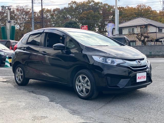 フィットハイブリッド Ｌパッケージ　４ＷＤ　オートクルーズ　ハーフレザー　ナビ　フルセグ　Ｂカメラ　Ｂｌｕｅｔｏｏｔｈオーディオ　ＥＴＣ　Ｉストップ　ＬＥＤヘッドライト　１５インチＡＷ　スマキー　禁煙車　横滑り防止　ＡＢＳ　電格ミラー（15枚目）