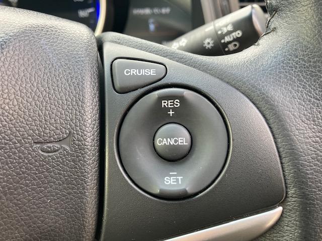 フィットハイブリッド Ｌパッケージ　４ＷＤ　オートクルーズ　ハーフレザー　ナビ　フルセグ　Ｂカメラ　Ｂｌｕｅｔｏｏｔｈオーディオ　ＥＴＣ　Ｉストップ　ＬＥＤヘッドライト　１５インチＡＷ　スマキー　禁煙車　横滑り防止　ＡＢＳ　電格ミラー（24枚目）