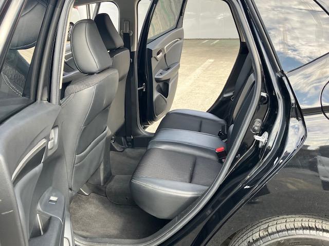 フィットハイブリッド Ｌパッケージ　４ＷＤ　オートクルーズ　ハーフレザー　ナビ　フルセグ　Ｂカメラ　Ｂｌｕｅｔｏｏｔｈオーディオ　ＥＴＣ　Ｉストップ　ＬＥＤヘッドライト　１５インチＡＷ　スマキー　禁煙車　横滑り防止　ＡＢＳ　電格ミラー（33枚目）