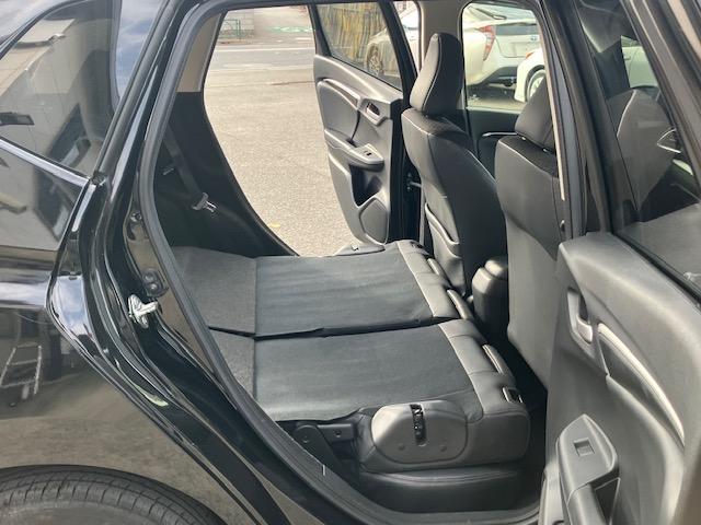 フィットハイブリッド Ｌパッケージ　４ＷＤ　オートクルーズ　ハーフレザー　ナビ　フルセグ　Ｂカメラ　Ｂｌｕｅｔｏｏｔｈオーディオ　ＥＴＣ　Ｉストップ　ＬＥＤヘッドライト　１５インチＡＷ　スマキー　禁煙車　横滑り防止　ＡＢＳ　電格ミラー（35枚目）