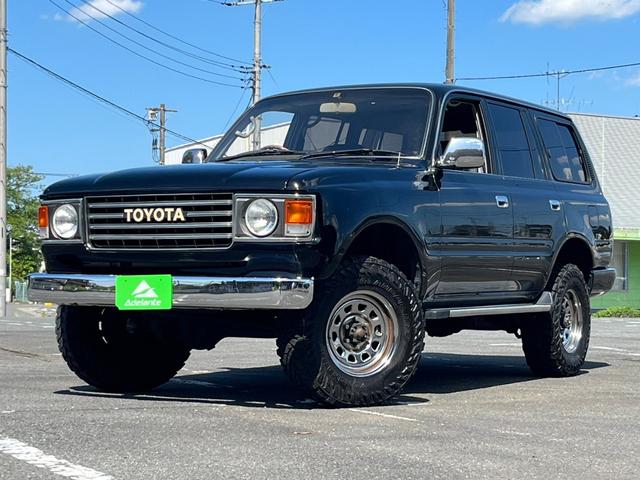 ランドクルーザー８０ ＶＸ　６０丸目フェイス・リフトアップ・ＴＯＹＯＴＡグリル・メッキバンパー・木製ハンドル・エクリプスナビ・地デジＴＶ・シートカバー・ＭＡＤタイヤ・サンルーフ・ＥＴＣ・リアクーラー（32枚目）