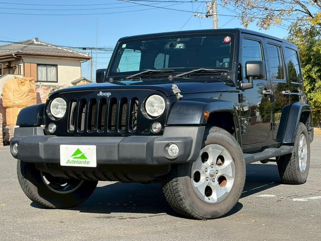 ジープ・ラングラーアンリミテッド サハラ　ユーザー買取車両・カロッツェリアナビ・地デジＴＶ・バックカメラ・Ｂｌｕｅｔｏｏｔｈオーディオ・サイドカメラ・キーレス・純正１６インチアルミ・背面タイヤ・フォグランプ（44枚目）