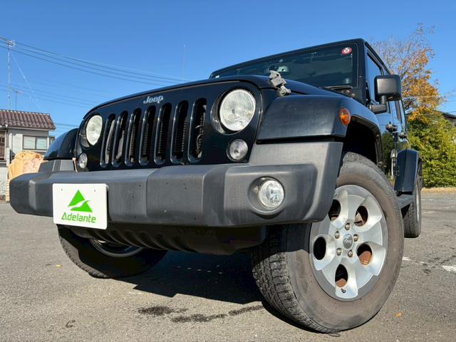 ジープ・ラングラーアンリミテッド サハラ　ユーザー買取車両・カロッツェリアナビ・地デジＴＶ・バックカメラ・Ｂｌｕｅｔｏｏｔｈオーディオ・サイドカメラ・キーレス・純正１６インチアルミ・背面タイヤ・フォグランプ（45枚目）