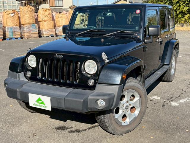 ジープ・ラングラーアンリミテッド サハラ　ユーザー買取車両・カロッツェリアナビ・地デジＴＶ・バックカメラ・Ｂｌｕｅｔｏｏｔｈオーディオ・サイドカメラ・キーレス・純正１６インチアルミ・背面タイヤ・フォグランプ（46枚目）