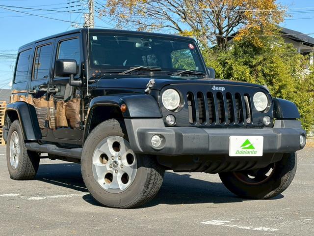 ジープ・ラングラーアンリミテッド サハラ　ユーザー買取車両・カロッツェリアナビ・地デジＴＶ・バックカメラ・Ｂｌｕｅｔｏｏｔｈオーディオ・サイドカメラ・キーレス・純正１６インチアルミ・背面タイヤ・フォグランプ（50枚目）