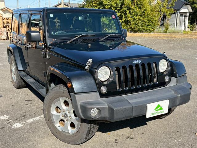 ジープ・ラングラーアンリミテッド サハラ　ユーザー買取車両・カロッツェリアナビ・地デジＴＶ・バックカメラ・Ｂｌｕｅｔｏｏｔｈオーディオ・サイドカメラ・キーレス・純正１６インチアルミ・背面タイヤ・フォグランプ（52枚目）