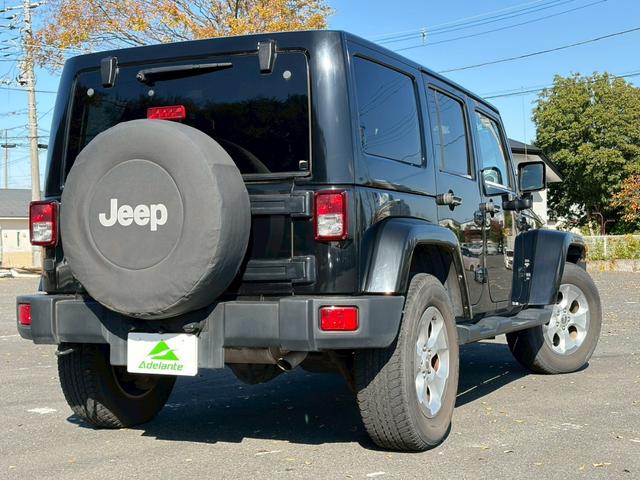 ジープ・ラングラーアンリミテッド サハラ　ユーザー買取車両・カロッツェリアナビ・地デジＴＶ・バックカメラ・Ｂｌｕｅｔｏｏｔｈオーディオ・サイドカメラ・キーレス・純正１６インチアルミ・背面タイヤ・フォグランプ（53枚目）