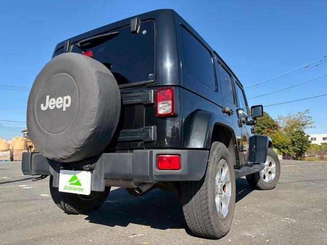 ジープ・ラングラーアンリミテッド サハラ　ユーザー買取車両・カロッツェリアナビ・地デジＴＶ・バックカメラ・Ｂｌｕｅｔｏｏｔｈオーディオ・サイドカメラ・キーレス・純正１６インチアルミ・背面タイヤ・フォグランプ（54枚目）