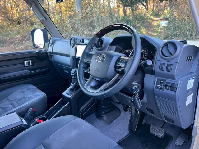 ランドクルーザー70 AX 全国1年保証・デフロック・純正ナビ・地デジTV・バックカメラ・ドライブレコーダー・ハーフレザーシート・LEDヘッドライト・ETC・クルーズコントロール・純正アルミホイール・USB端子・ユーザー買取車(13枚目)