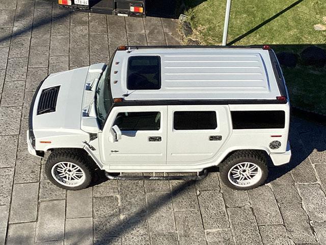 ハマーＨ２ ラグジュアリーパッケージ４ＷＤ　１ナンバー　４ＷＤ　車検あり　ＥＴＣ　地デジナビ　サードシート付き　社外マフラー　サンルーフ付き　本革シート　社外ホイール（59枚目）