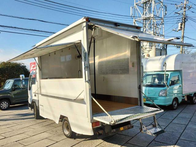 タイタンダッシュ キッチンカー フードトラック ケータリングカー ガソリン車 内装新品 中型キッチンカー 中型移動販売車 シンク 給排水タンク 作業台 外部電源コンセント バックモニター 移動販売車 ETC TV&ナビ(12枚目)