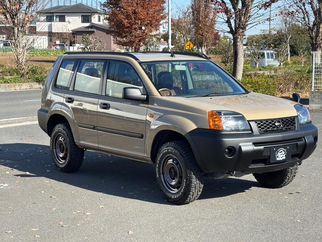 エクストレイル Ｓ　切り替え式４ＷＤ／オールペイント／アウトドアカスタム／新品リフトアップサス／新品ホイールタイヤセット／新品ヴィンテージ調シートカバー／新品パネル＆ハンドル／ヘッドライトインナーブラック加工（13枚目）