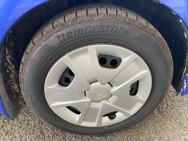 フィットハイブリッド ハイブリッド・１０ｔｈアニバーサリー　ＥＴＣ　オーディオ　ＡＵＸ接続　　クルーズコントロール　スマートキー　スペアキー有り　ベンチシート（46枚目）