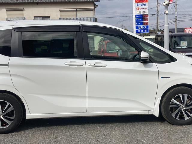 フリードハイブリッド ハイブリッド・Ｇホンダセンシング　ナビ　バックカメラ　ＥＴＣ　Ｂｌｕｅｔｏｏｔｈ接続　フルセグＴＶ　両側電動スライドドア　ＬＥＤヘッドライト　アクティブコーナリングライト　スマートキー　スペアキー有り　ドラレコ（21枚目）