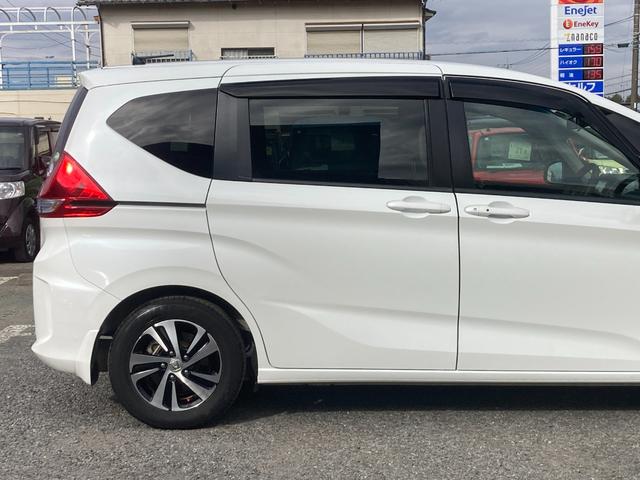 フリードハイブリッド ハイブリッド・Ｇホンダセンシング　ナビ　バックカメラ　ＥＴＣ　Ｂｌｕｅｔｏｏｔｈ接続　フルセグＴＶ　両側電動スライドドア　ＬＥＤヘッドライト　アクティブコーナリングライト　スマートキー　スペアキー有り　ドラレコ（22枚目）