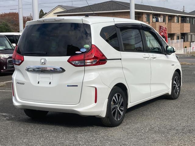 フリードハイブリッド ハイブリッド・Ｇホンダセンシング　ナビ　バックカメラ　ＥＴＣ　Ｂｌｕｅｔｏｏｔｈ接続　フルセグＴＶ　両側電動スライドドア　ＬＥＤヘッドライト　アクティブコーナリングライト　スマートキー　スペアキー有り　ドラレコ（24枚目）