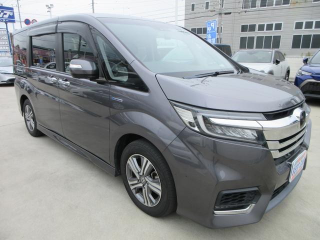 ステップワゴンスパーダ スパーダハイブリッド　Ｇ　ホンダセンシング　純正ナビ　フルセグＴＶ　全周囲カメラ　後席フリップダウンモニター　両側パワースライドドア　アダプティブクルーズコントロール　ドラレコ　ＥＴＣ　わくわくゲート（6枚目）