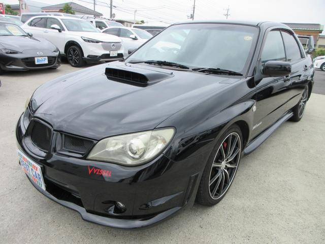 インプレッサ ＷＲＸ　５速ＭＴ　４ＷＤ　リアスポイラー　ＳＴＩマフラー　カロッツェリアオーディオ　バックカメラ　ＥＴＣ　純正ｍｏｍｏステアリング　社外１８インチＡＷ　キーレスエントリー　Ｂｌｕｅｔｏｏｔｈ（7枚目）