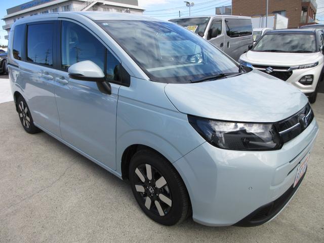 フリード ｅ：ＨＥＶエアー　ＥＸ　純正９型ナビ　フルセグＴＶ　バックカメラ　両側パワースライドドア　アダプティブクルーズコントロール　ＥＴＣ　ブラインドスポットモニター　ハーフレザーシート　シートヒーター　ＬＥＤヘッド　スマートキー（6枚目）