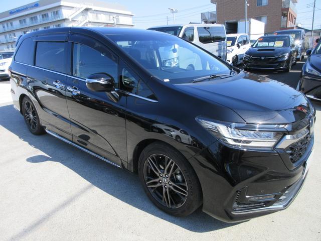 オデッセイハイブリッド e:HEVアブソルート・EX ホンダセンシング レザーシート 純正10インチナビ フルセグTV 後席フリップダウンモニター 全周囲カメラ パワーバックドア 両側パワースライドドア ドラレコ ETC シートヒーター パワーシート(6枚目)