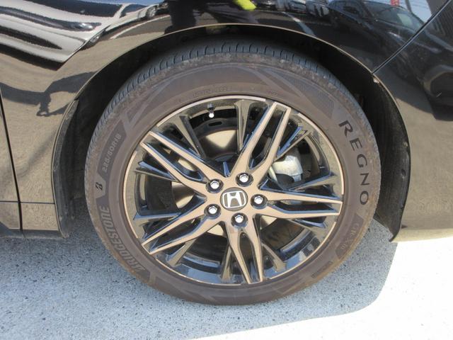 オデッセイハイブリッド e:HEVアブソルート・EX ホンダセンシング レザーシート 純正10インチナビ フルセグTV 後席フリップダウンモニター 全周囲カメラ パワーバックドア 両側パワースライドドア ドラレコ ETC シートヒーター パワーシート(12枚目)