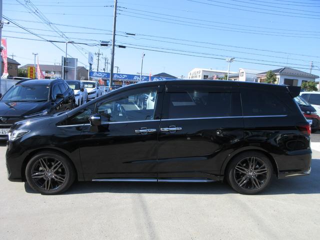 オデッセイハイブリッド e:HEVアブソルート・EX ホンダセンシング レザーシート 純正10インチナビ フルセグTV 後席フリップダウンモニター 全周囲カメラ パワーバックドア 両側パワースライドドア ドラレコ ETC シートヒーター パワーシート(14枚目)