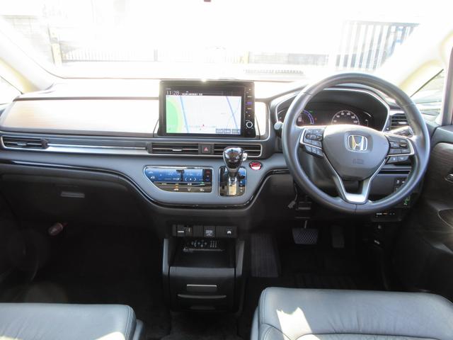 オデッセイハイブリッド e:HEVアブソルート・EX ホンダセンシング レザーシート 純正10インチナビ フルセグTV 後席フリップダウンモニター 全周囲カメラ パワーバックドア 両側パワースライドドア ドラレコ ETC シートヒーター パワーシート(50枚目)