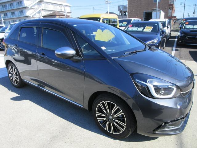 フィット e:HEVリュクス 純正9型ナビ フルセグTV 全周囲カメラ アダプティブクルーズコントロール ドラレコ ETC ハーフレザーシート シートヒーター ステアリングヒーター ブラインドスポットモニター LEDヘッドライト(6枚目)