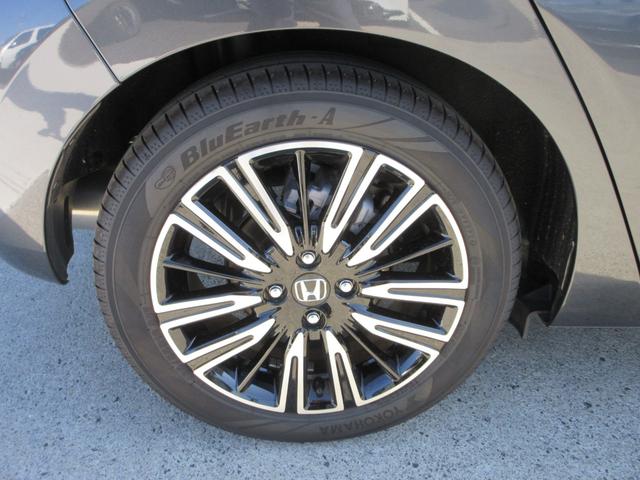 フィット e:HEVリュクス 純正9型ナビ フルセグTV 全周囲カメラ アダプティブクルーズコントロール ドラレコ ETC ハーフレザーシート シートヒーター ステアリングヒーター ブラインドスポットモニター LEDヘッドライト(11枚目)